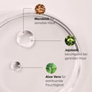 Body-Shaving-Oil in Schale, Nahaufnahmen verschiedener Inhaltsstoffe.