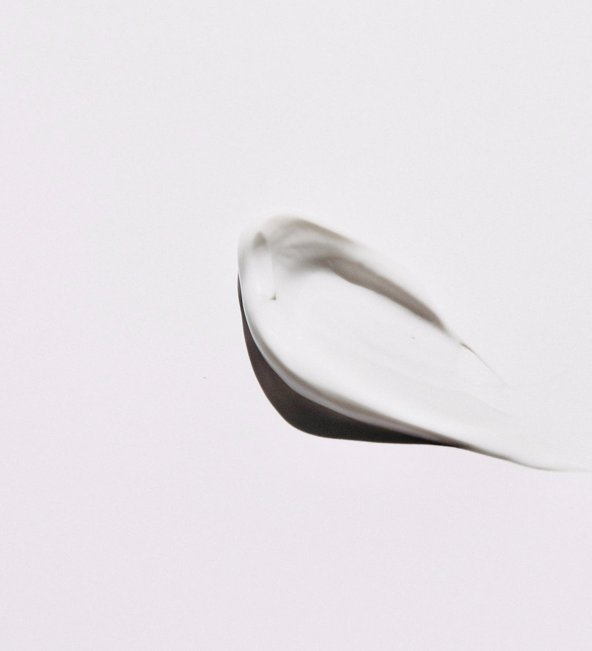 White cream spread on a smooth surface.