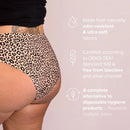 Leo Seamless Slip in beige worn from behind, image text on OEKO-TEX® Standard 100 and reusable fabrics