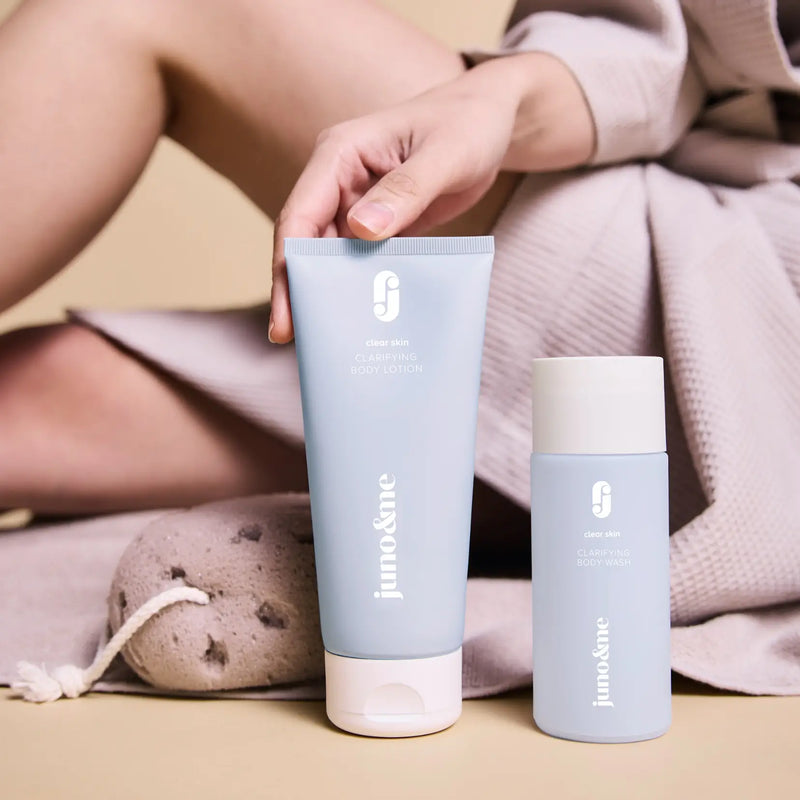 Juno Skincare Produkte stilvoll auf Stein präsentiert.