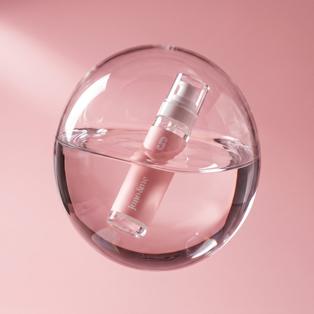 Décolleté Serum inside a transparent sphere of water